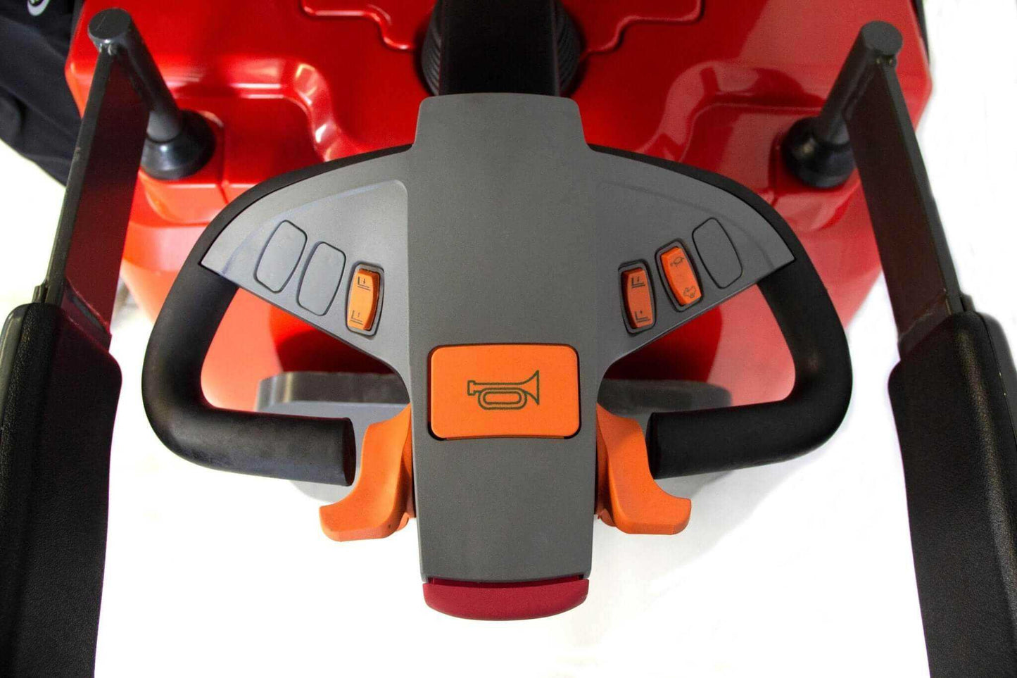 Close-up of control handle on PS3300FE-3M electric pallet stacker with horn and operation buttons
