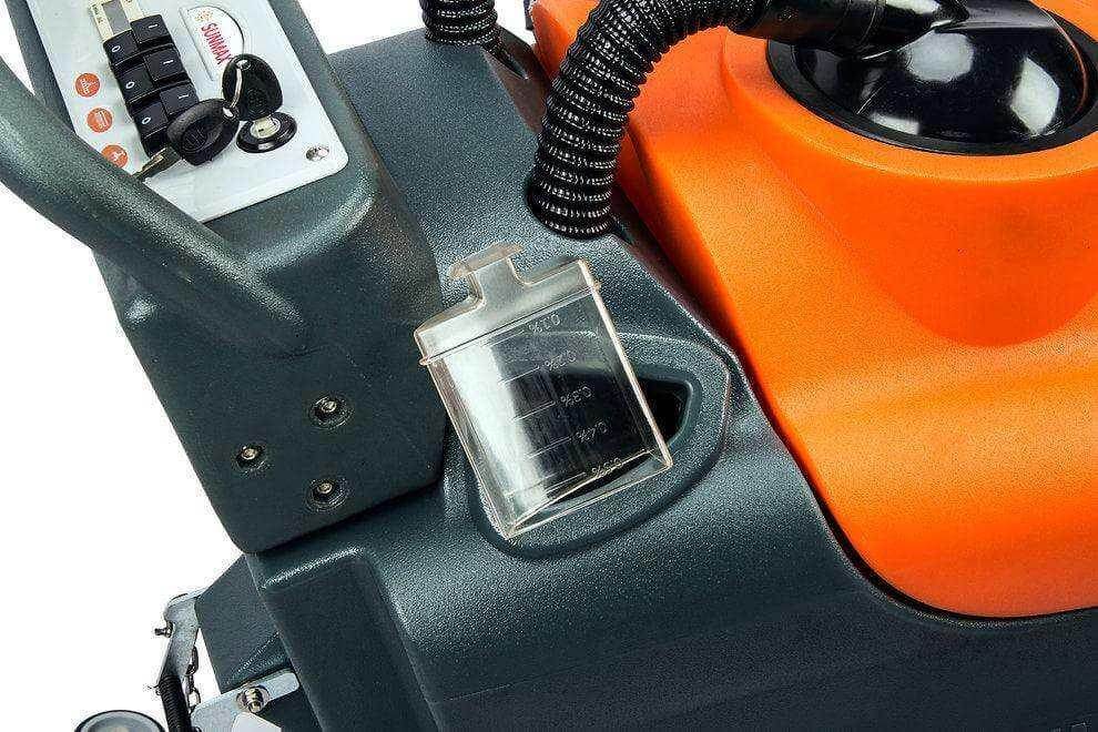 Close-up of RT50 battery powered walk-behind floor scrubber control panel and handle with orange and gray body.