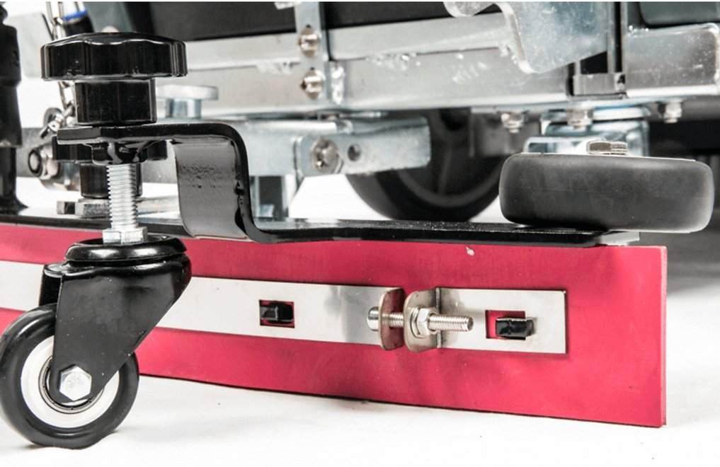 Close-up of RT50 battery powered walk-behind floor scrubber red cleaning squeegee and caster wheel