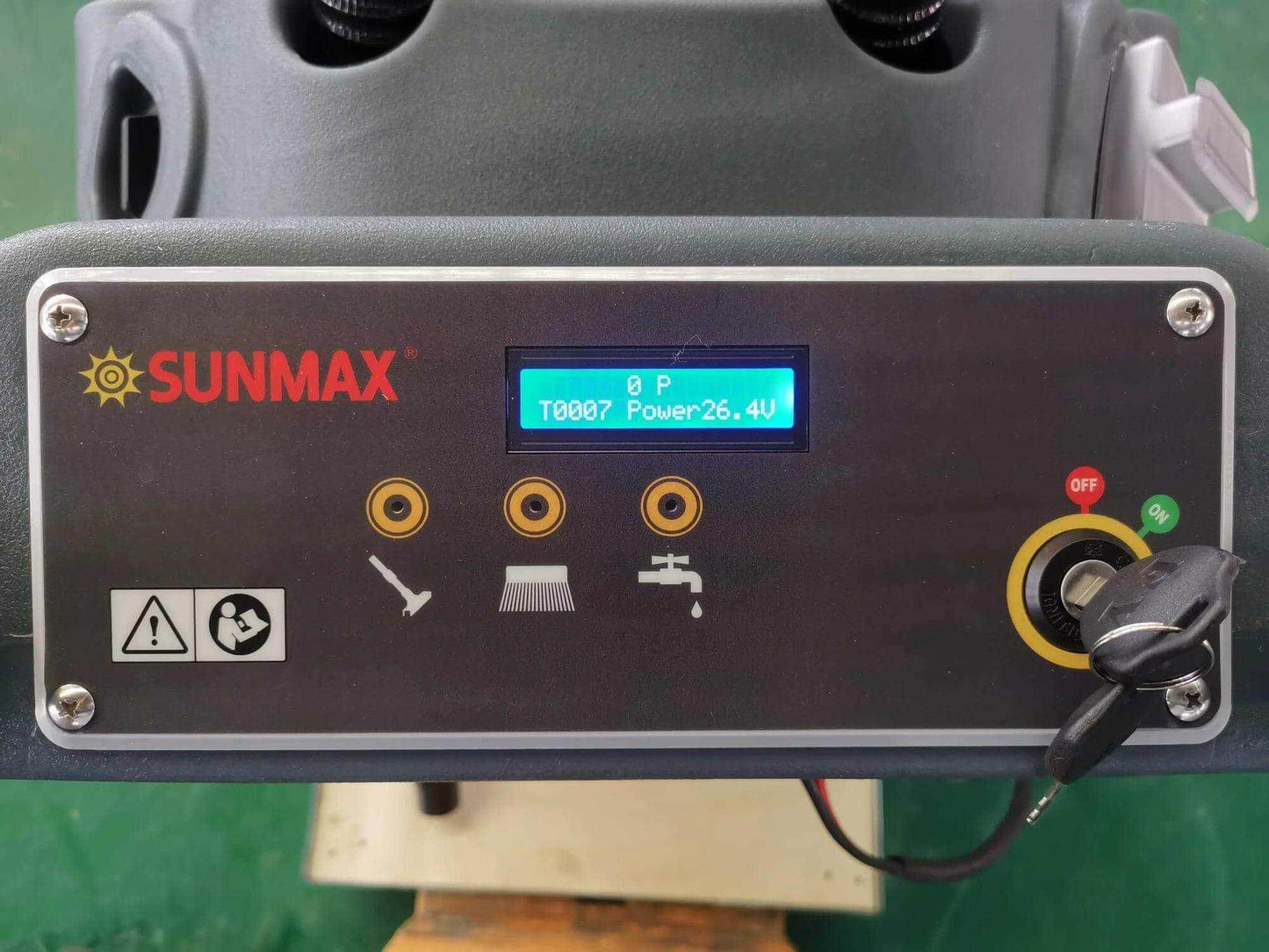 Control panel of SUNMAX RT50 battery powered walk-behind floor scrubber with power display and key switch