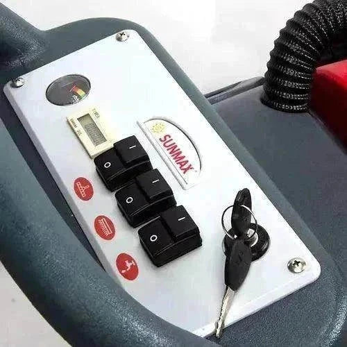 Control panel of SUNMAX RT50AC Walk-behind Commercial Floor Scrubber with power switches and key