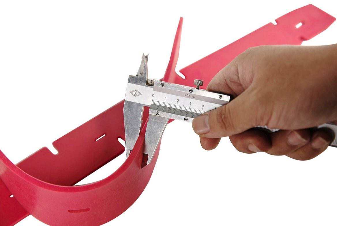 Red rubber part for SUNMAX 50 and 70 series floor scrubber machines with caliper measurement