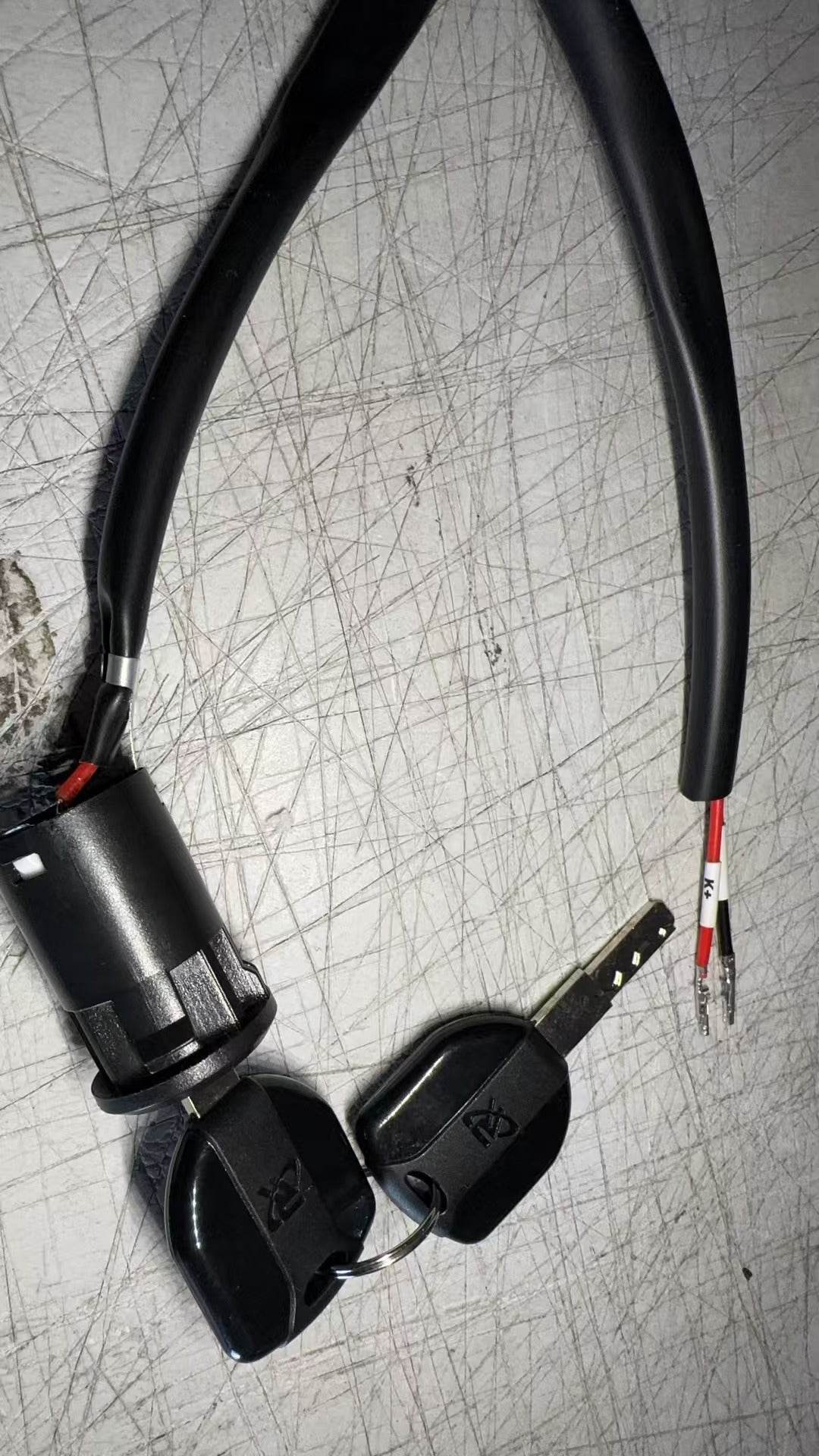 Lock and key set for floor scrubber machines with wiring harness